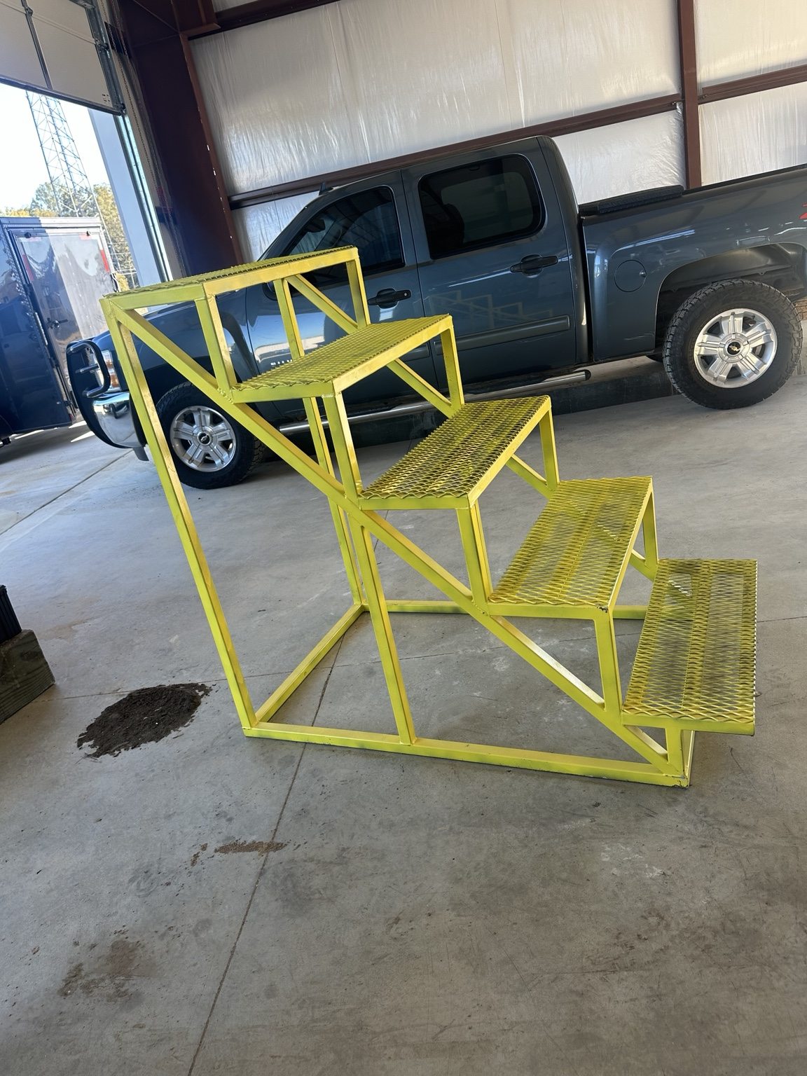 Fabricated yellow industrial steel steps