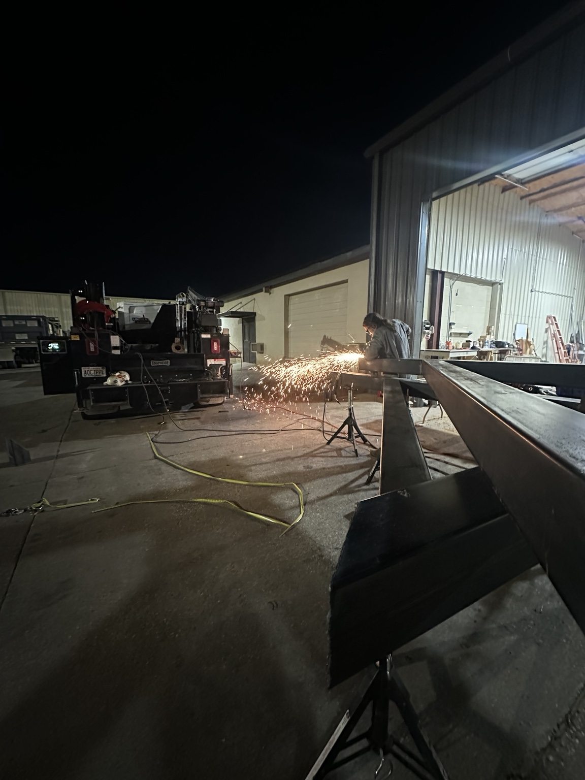 Grinding steel during fabrication outside the shop